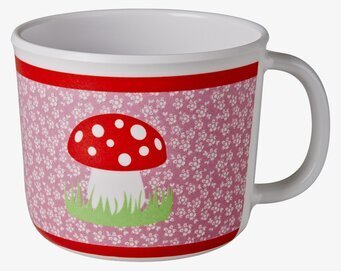 Foto av färgglad mugg med svampmotiv och blommor