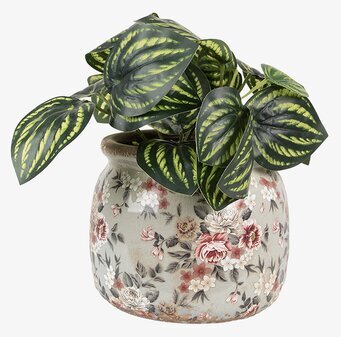 Bild av elegant kruka med blommönster och konstväxt