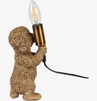 Bild av gyllene hundformad bordslampa med unik design