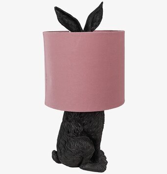 Bild av bordslampa med kaninformad bas och rosa skärm