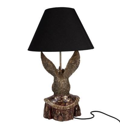 Bild av antik bordslampa med kaninform och svart skärm