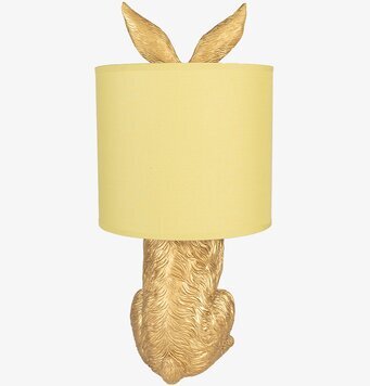 Bild på unik bordslampa med kaninform och guldfärg