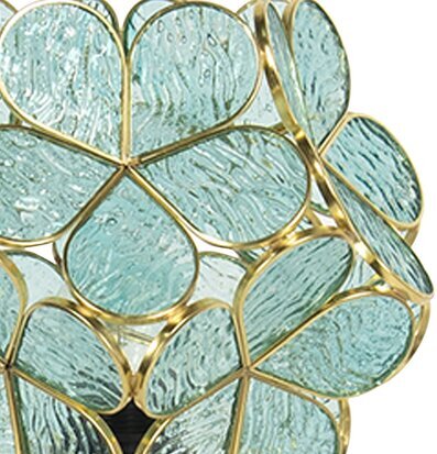 Foto av bordslampa med gröna glaspaneler och metallband