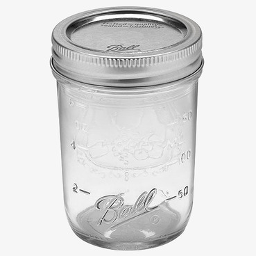 Bild av elegant glasburk för förvaring och dekoration