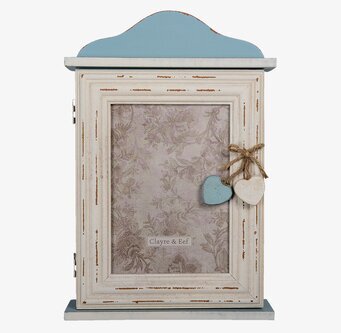 Bild av stilrent nyckelskåp med rustik och charmig design