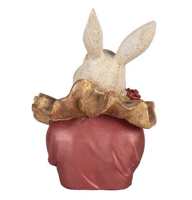 Bild av dekorativ kanin med elegant krage och rosett