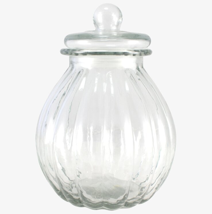 Bild av elegant glasburk med lock och räfflad design