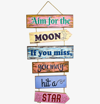 Bild av färgglad träskylt med inspirerande budskap