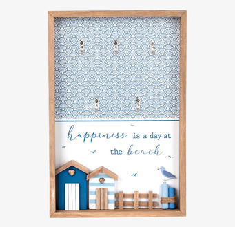 Bild av strandinspirerad nyckeltavla med maritim design