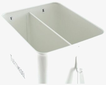 Bild av elegant och praktisk plåtburk för tvättmedel