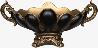 Bild av dekorativ skål i guld och svart med elegant fot