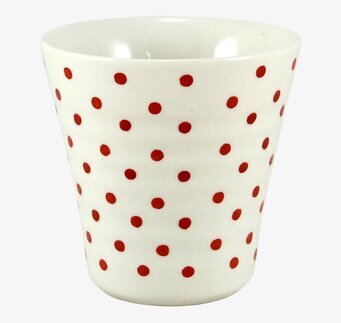 Foto av lattemugg med rödprickigt mönster och matt finish
