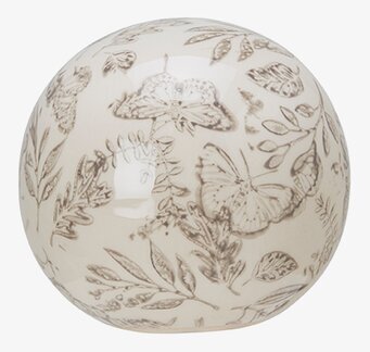 Bild av dekorativt klot med fjärilar och växtmotiv