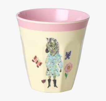 Bild av färgglad mugg med zebra och blommig design