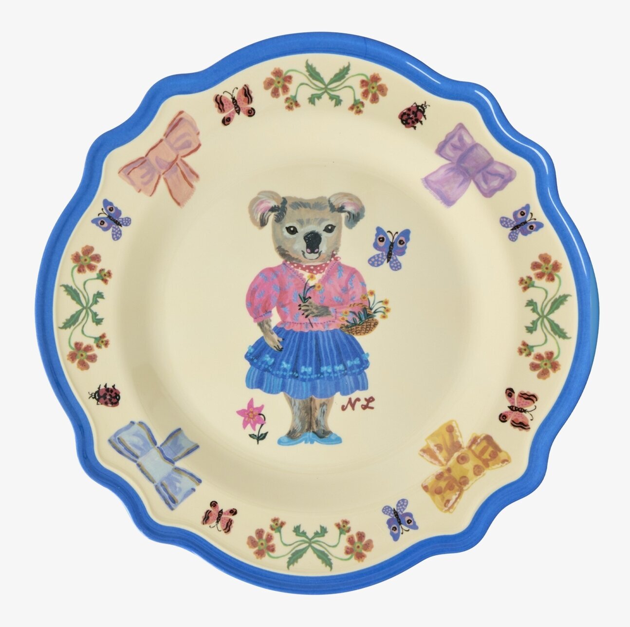 Bild av färgglad tallrik med koalamotiv och blommor