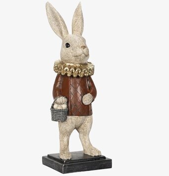 Bild av dekorativ kaninfigur med äggkorg i polyresin