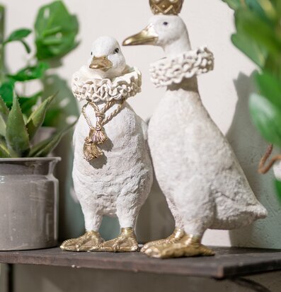 Bild av dekorativa ankor med eleganta gulddetaljer