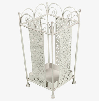 Bild av ett elegant paraplyställ med antikvit design