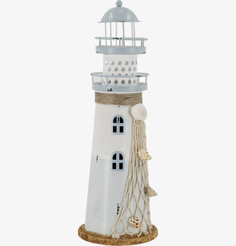 Bild av charmigt fyrtorn med nautisk inredningsstil