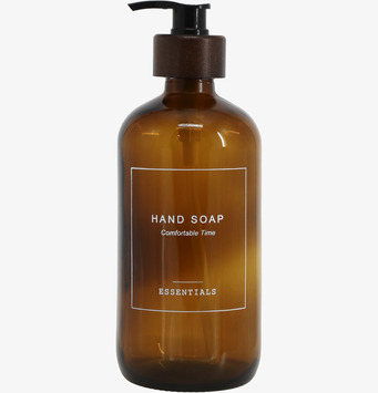 Bild på elegant bärnstensfärgad glasflaska med pump