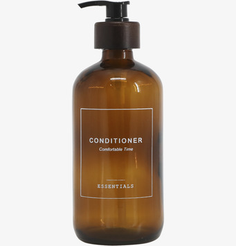 Bild av stilren glasflaska med pump och harmonisk design