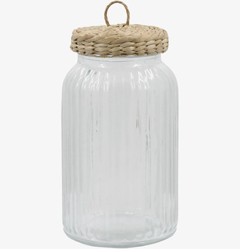 Bild av stor glasburk med flätat lock och elegant design