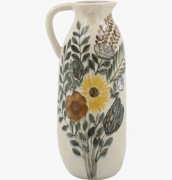 Bild av kanna med blomstermotiv och krackelerad yta