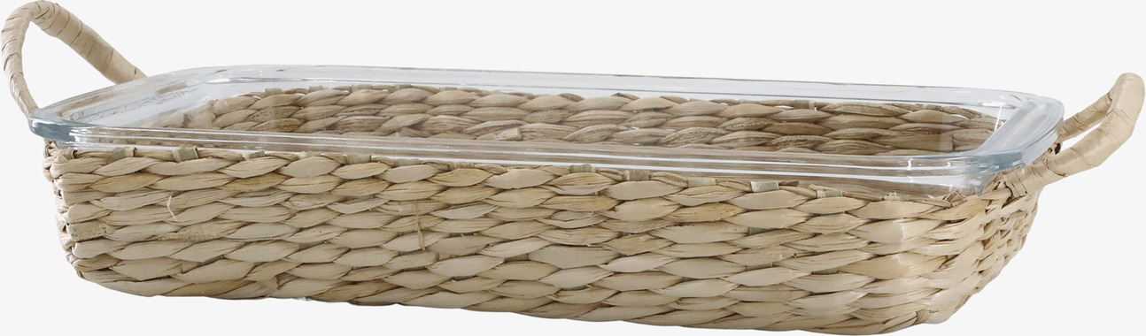 Bild av elegant glasform med flätad korg och handtag