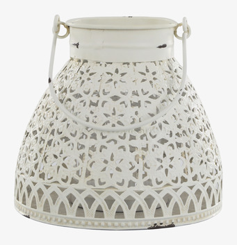 Bild av en ljuslykta med antik cremefärg och spetsmönster
