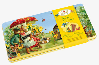 Bild av plåtask med påskchoklad och nostalgisk design