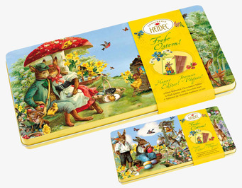 Bild av färgglad plåtask med påsktema och kaniner