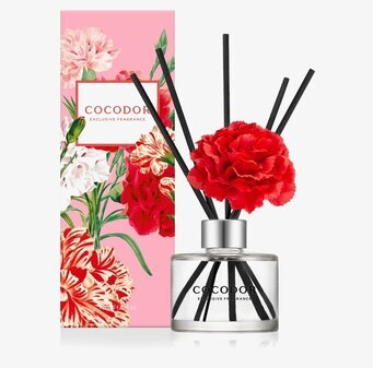 Bild av eleganta doftpinnar med röd blomma och förpackning