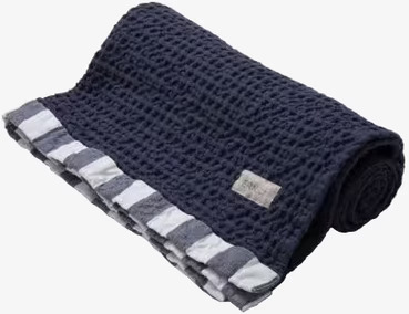 Bild av våfflad blå handduk med djup och elegans