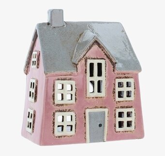 Bild av dekorativ rosa ljuslykta i form av ett hus