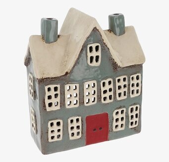 Bild av ljuslykta i form av ett skolhus med detaljer