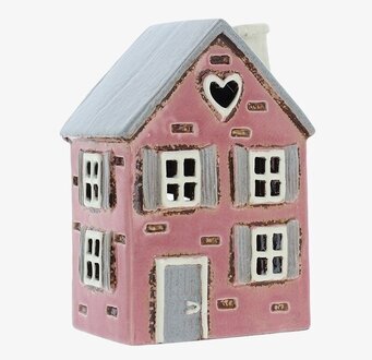 Bild av en charmig ljuslykta formad som ett litet hus