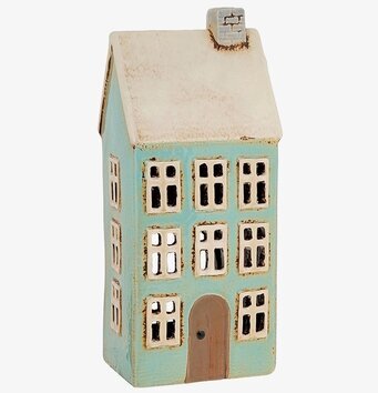 Bild av charmig ljuslykta som föreställer ett miniatyrhus