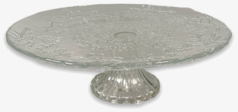 Bild av elegant kakfat i glas med naturinspirerat mönster