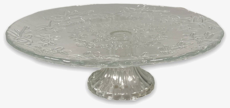 Bild av elegant kakfat i glas med naturinspirerat mönster