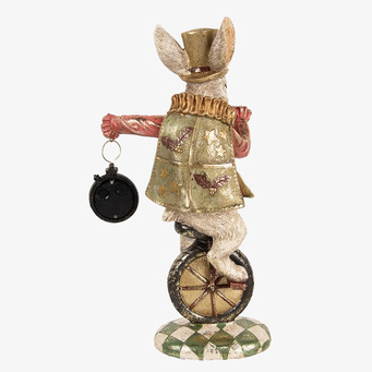 Bild av fantasifull kanin på enhjuling med gulddetaljer