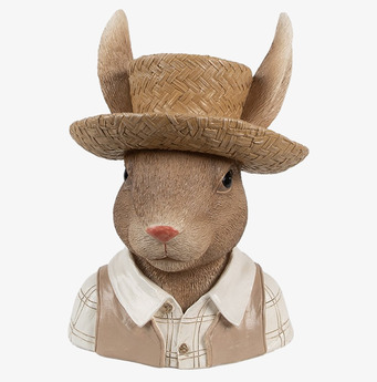 Bild av en stilfull kaninfigurin med hatt och väst