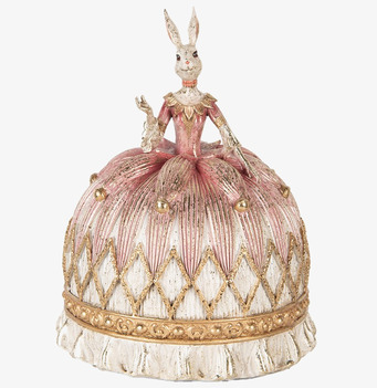 Bild av dekorativ kaninfigur i vitt och rosa klänning
