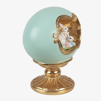 Bild av dekorativ pjäs med kaniner i turkos och guld