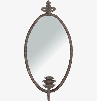 Bild av elegant väggdekoration med spegel och ljushållare