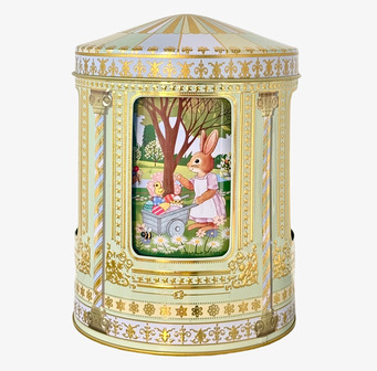 Bild av en nostalgisk plåtburk med musik och påskmotiv