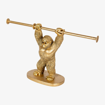 Bild av dekorativ gorillapappershållare i guldmaterial