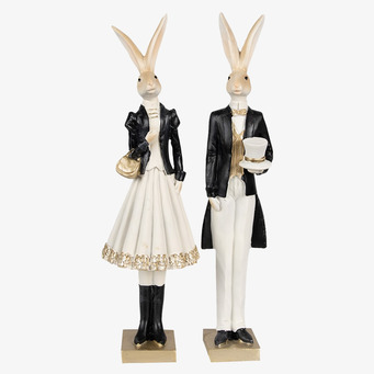 Bild av stilfulla kanindekorationer i guld och svart