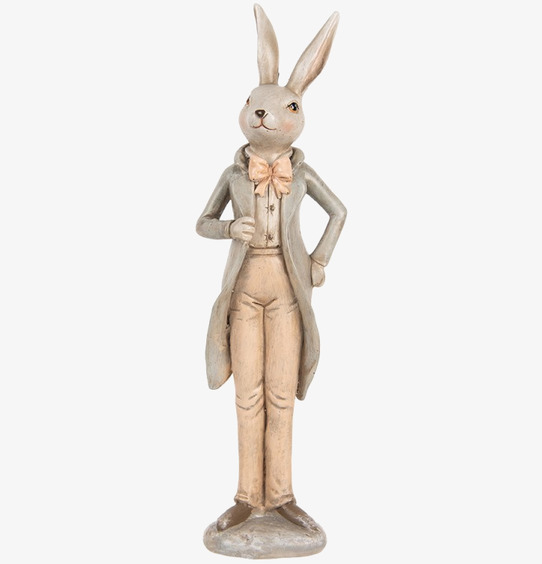 Bild av charmig kaninfigur i elegant frack och rosett