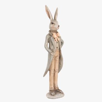 Bild av elegant kaninfigur i frack och rosett