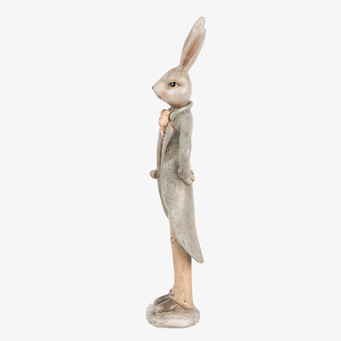 Bild av dekorativ kaninfigur i elegant frack och rosett